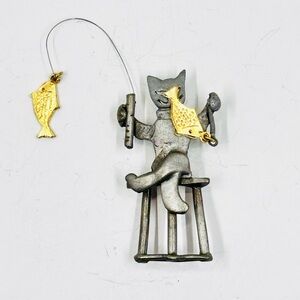 JJ Inspired Silver Tone Fishing Cat Brooch with Dangling Gold Fish Accents
